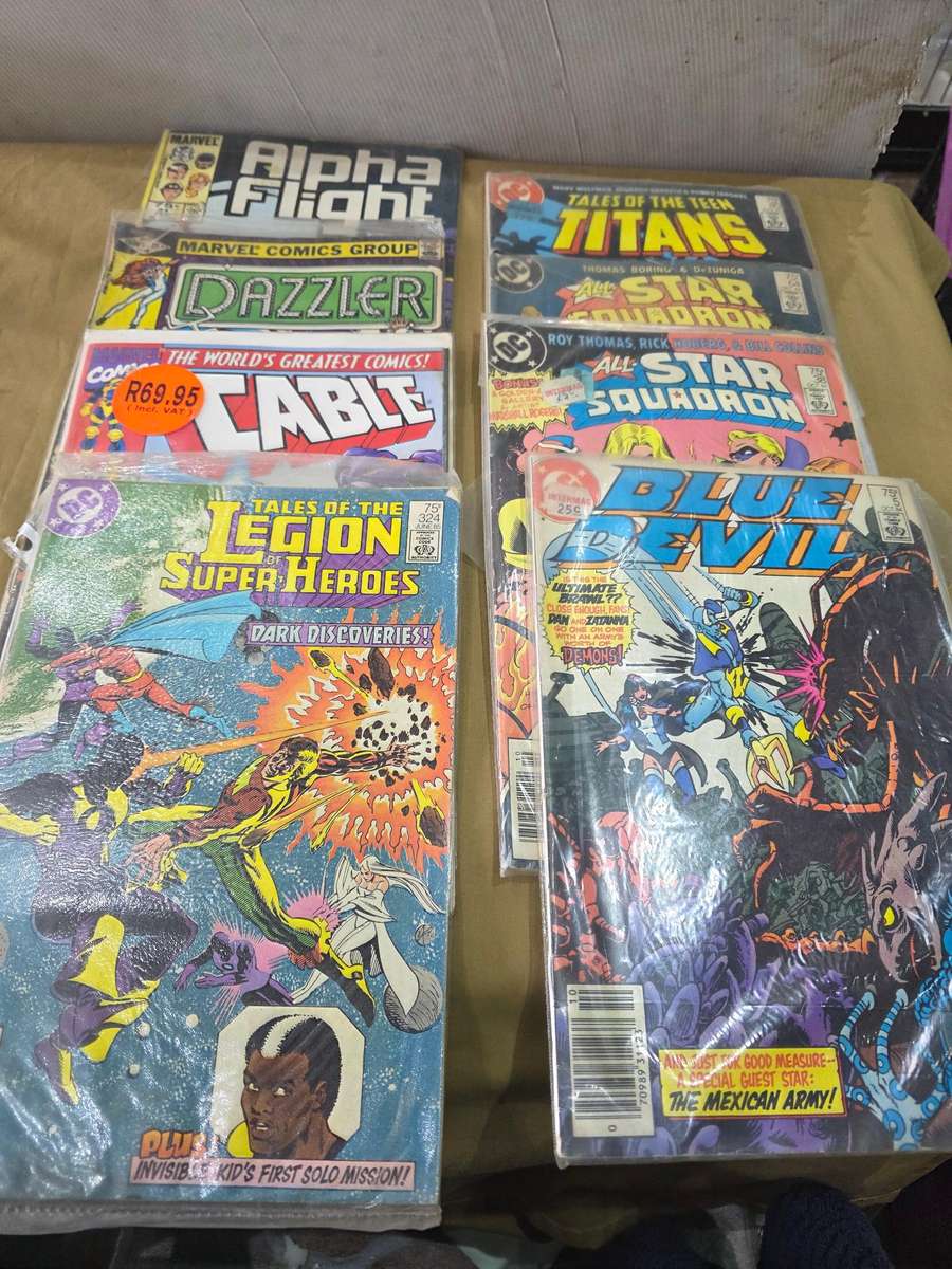 8 X DC/ MARVEL VINTAGE PAPERBACK COMICS