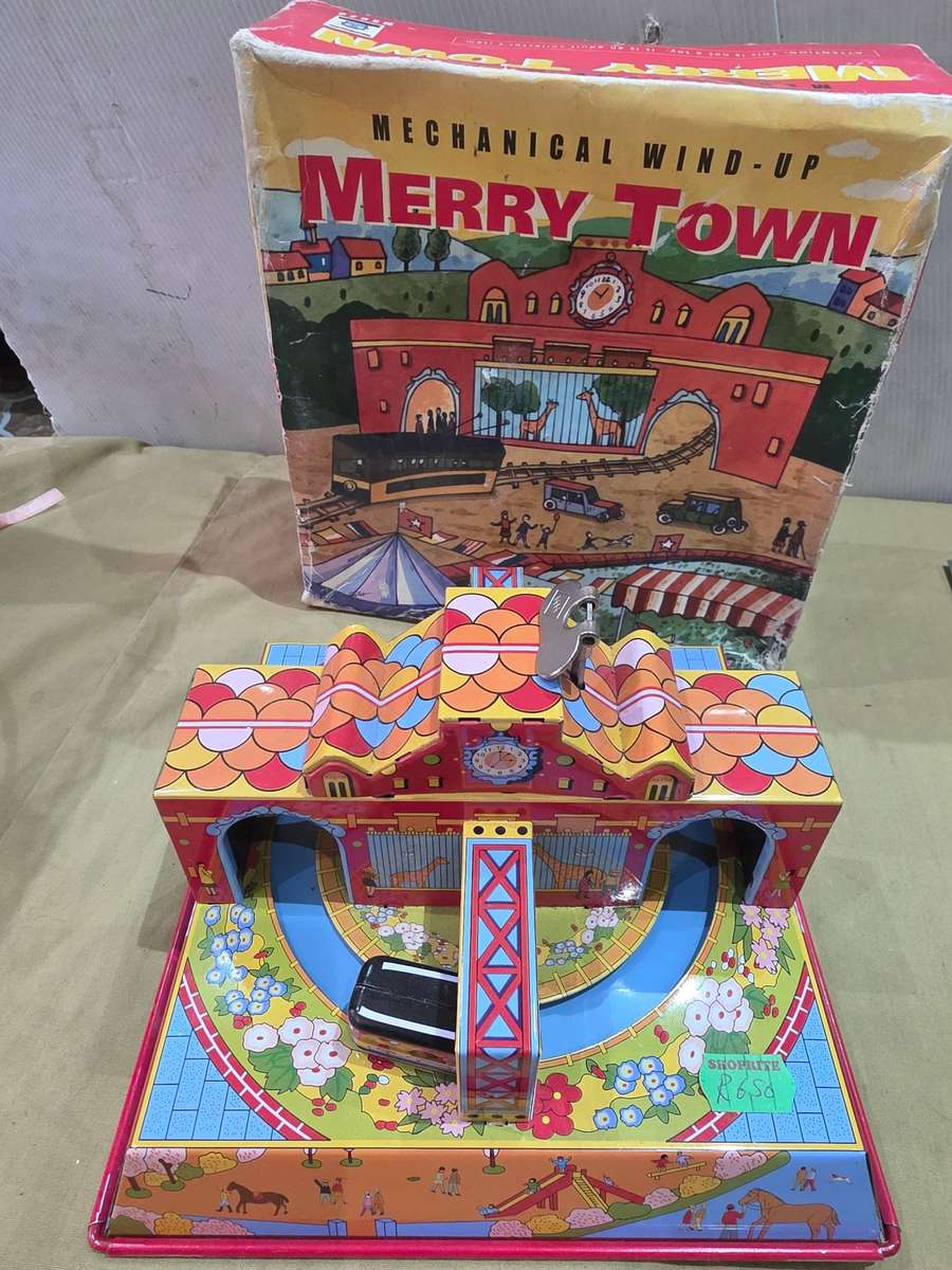VINTAGE MECHANICAL WINDE-UP MERRY TOWN(TIN TOY)