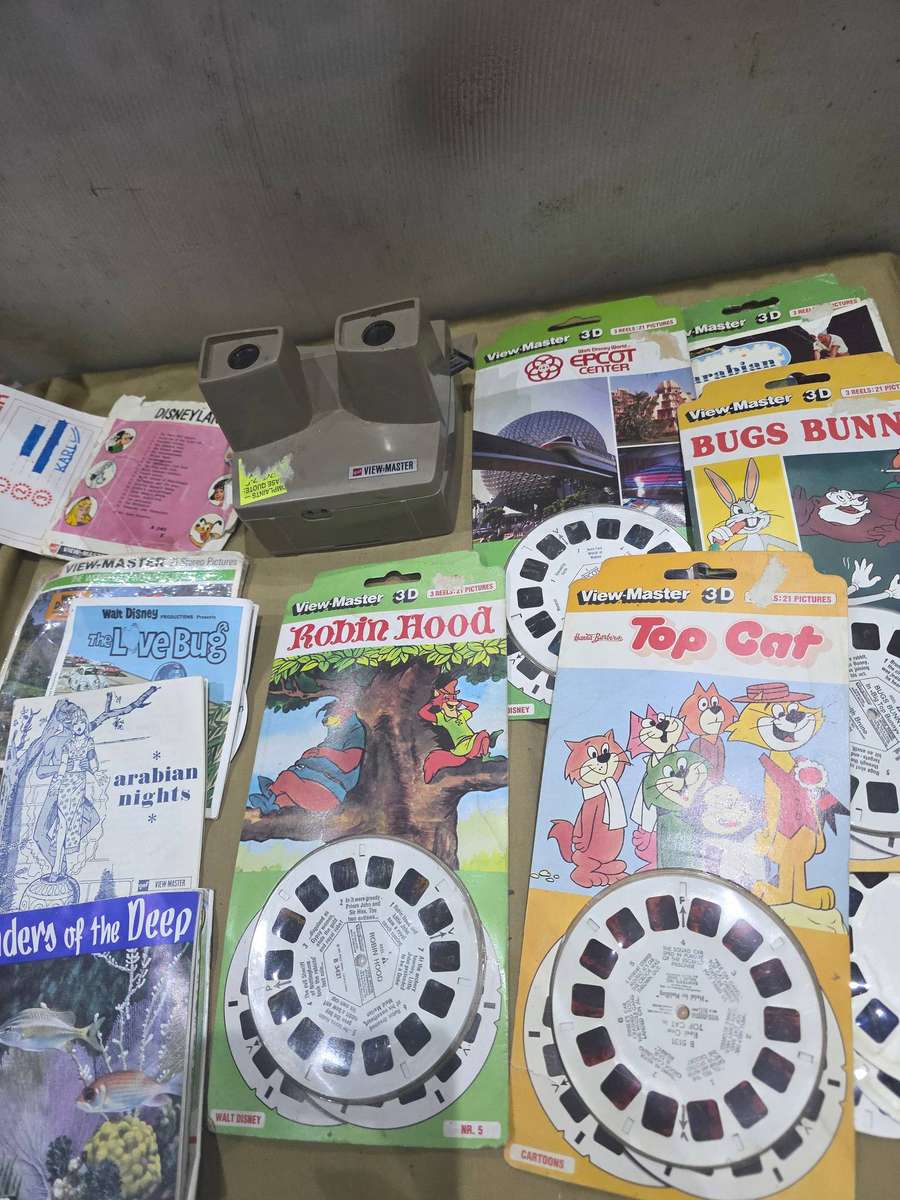 VIEWMASTER SLIDE VIEWER INCL.NUMEROUS COLLECTABLE SLIDES(MOST UNOPENED SLIDES)