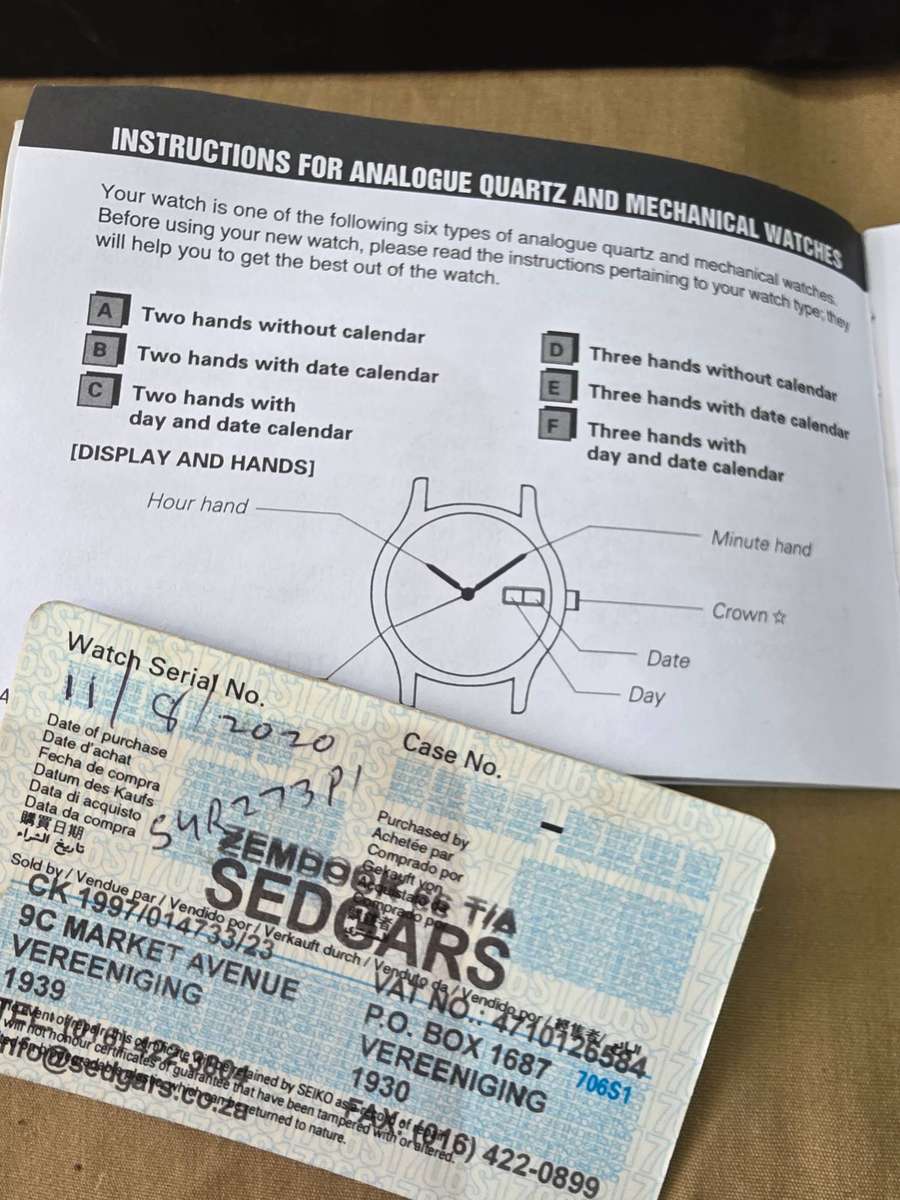 SEIKO MENS WRISTWATCH(ANALOGUE QUARTZ)WITH AUNTHETIC BOOKLET