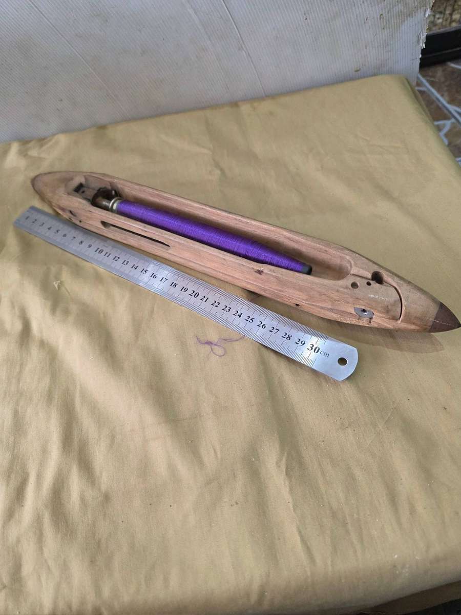 VERY OLD BOAT SHUTTLE