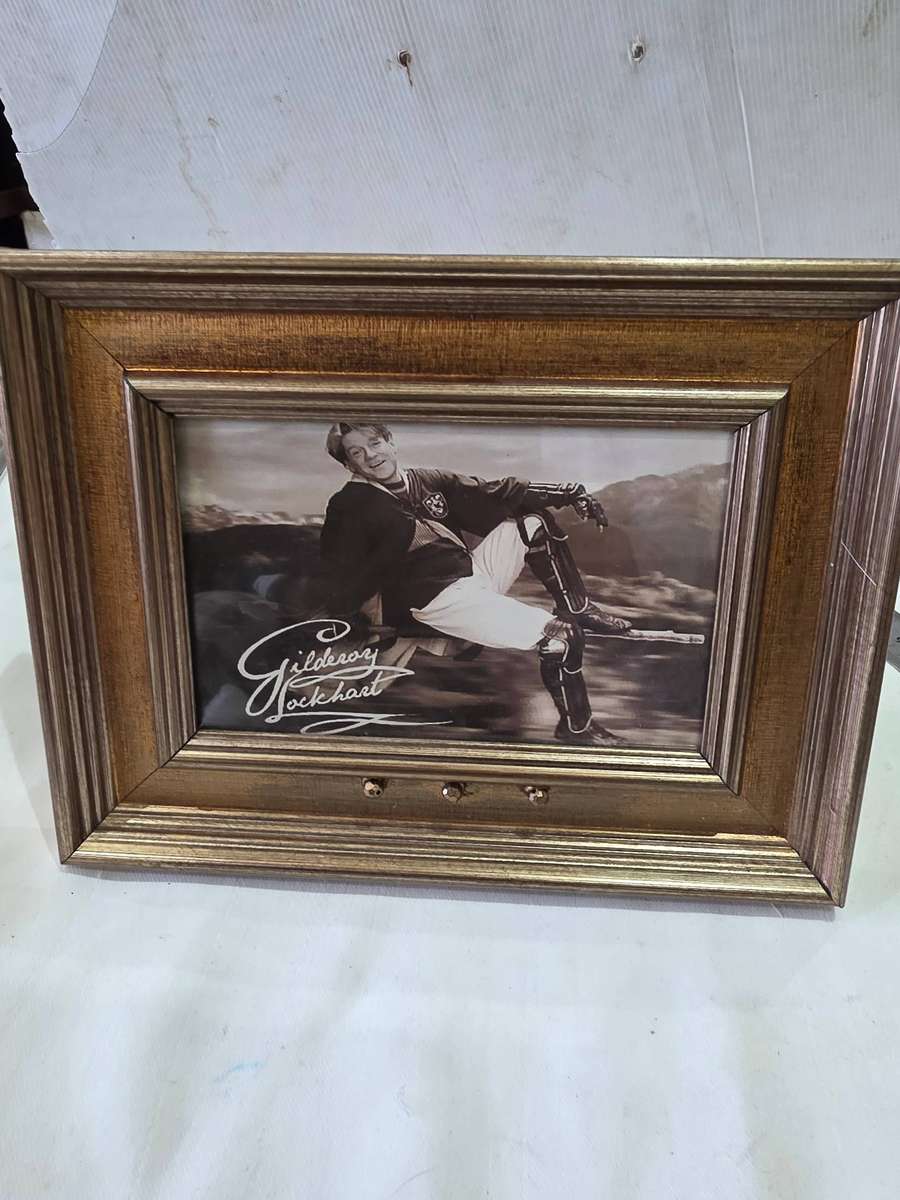 HARRY POTTER SIGNED GILDEROY LOCKHART BLACK AND WHITE PHOTO FRAME