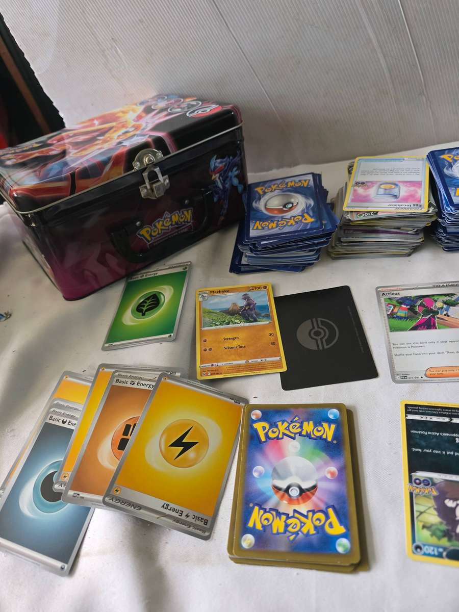 COLLECTION OF OVER 350 MIXED LOT POKEMAN CARDS INCL.A METAL POKEMAN CASE