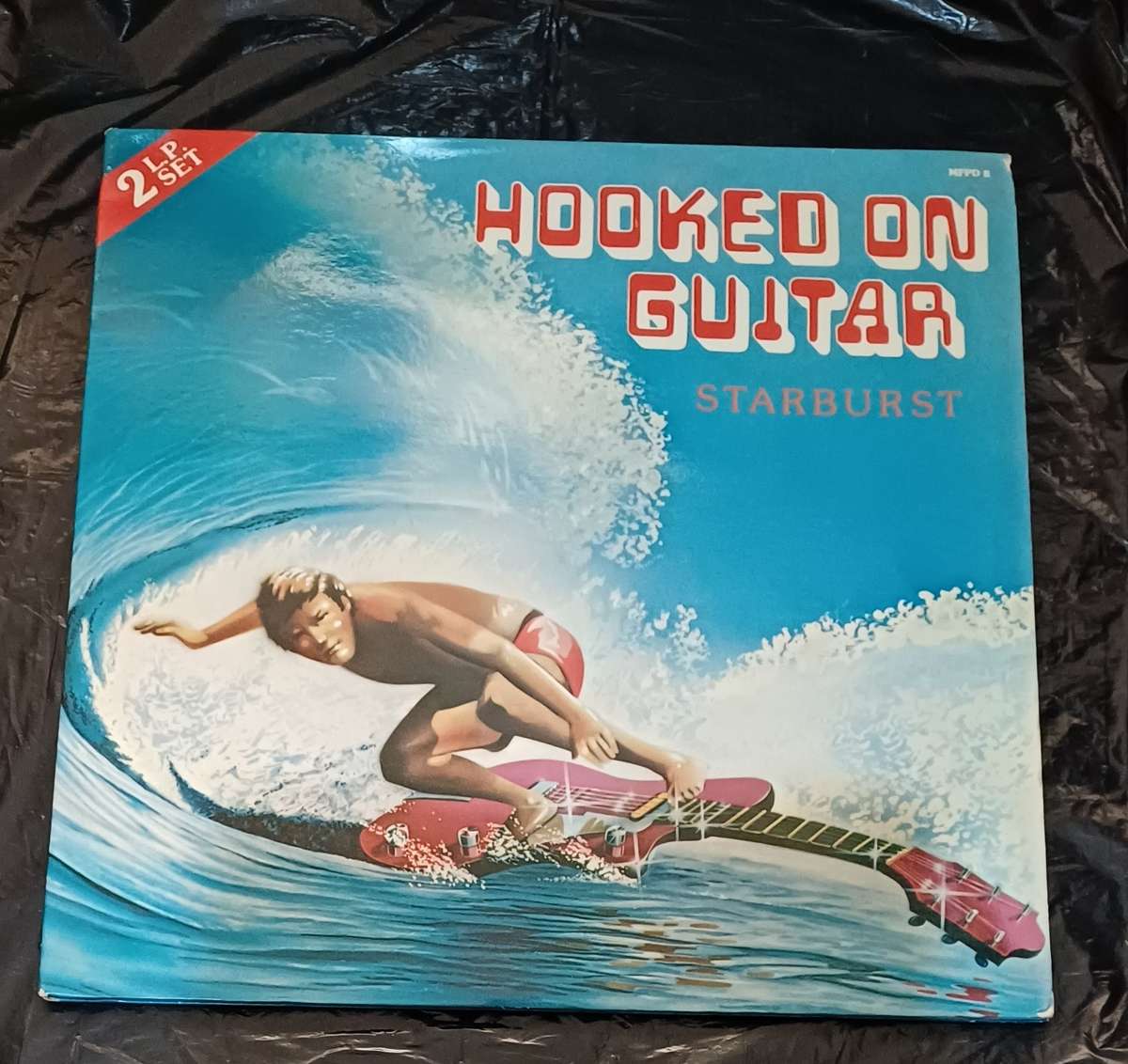 STARBURST - HOOKED ON GUITAR