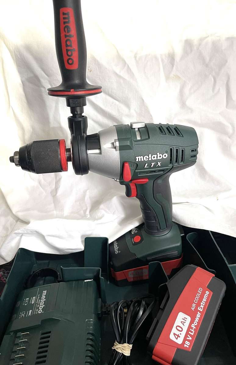 Metabo SB 18 LTX Impulse Cordless Hammer Drill, with batteries case and charger, never used.