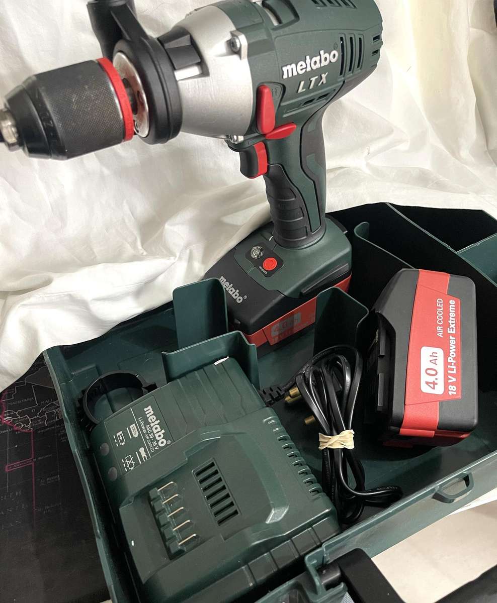 Metabo SB 18 LTX Impulse Cordless Hammer Drill, with batteries case and charger, never used.
