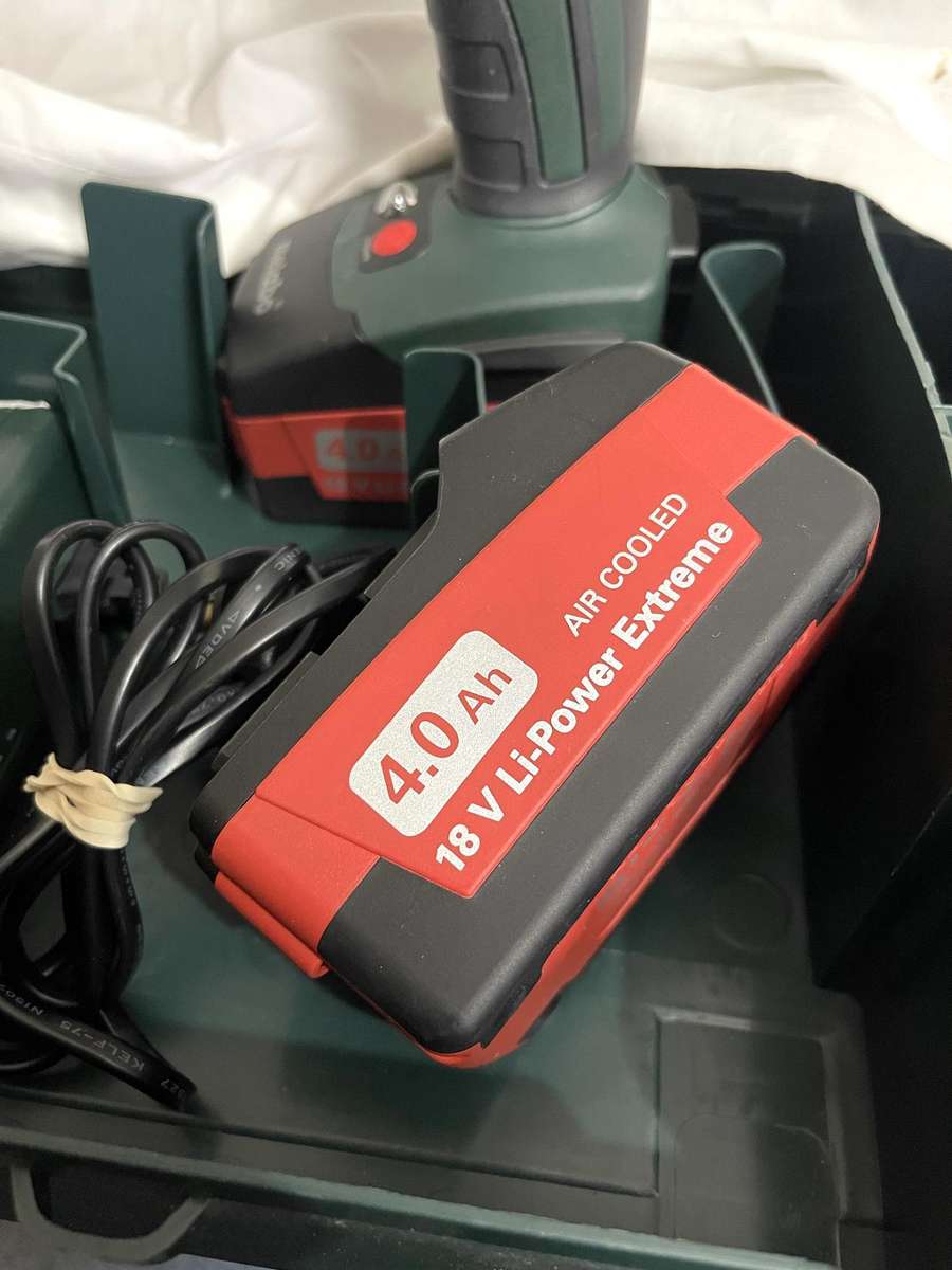 Metabo SB 18 LTX Impulse Cordless Hammer Drill, with batteries case and charger, never used.