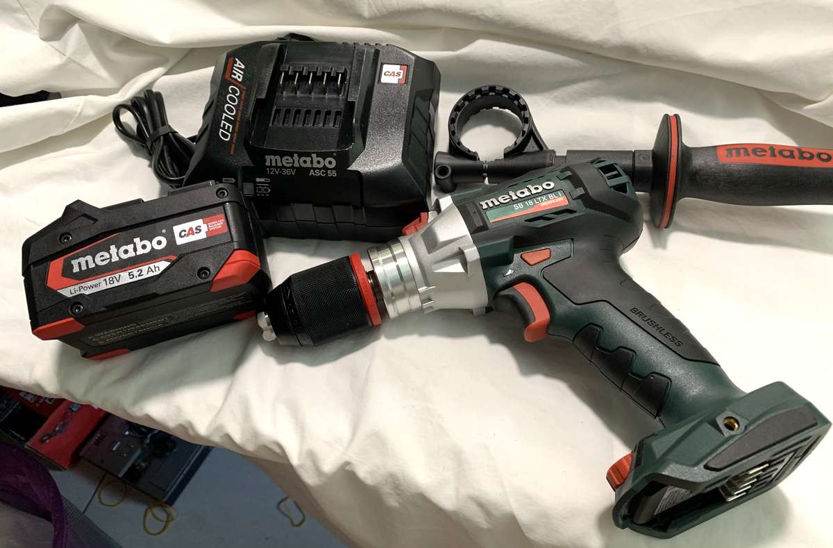 New Metabo 120Nm cordless Hammer Drill with battery and charger.