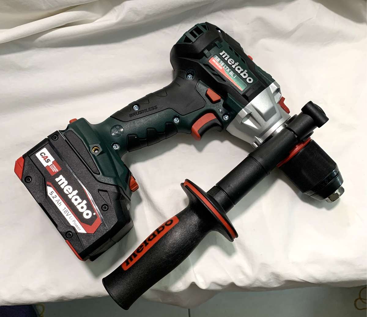 New Metabo 120Nm cordless Hammer Drill with battery and charger.