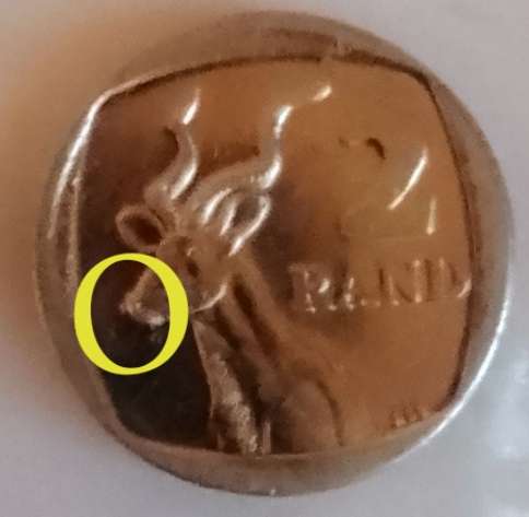 Red file with ERROR/ CRACKED DIE R2 coins and commemorative R5 coins