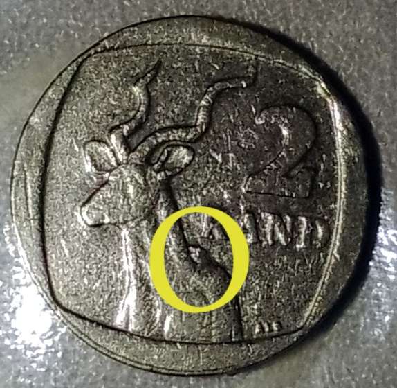 Red file with ERROR/ CRACKED DIE R2 coins and commemorative R5 coins