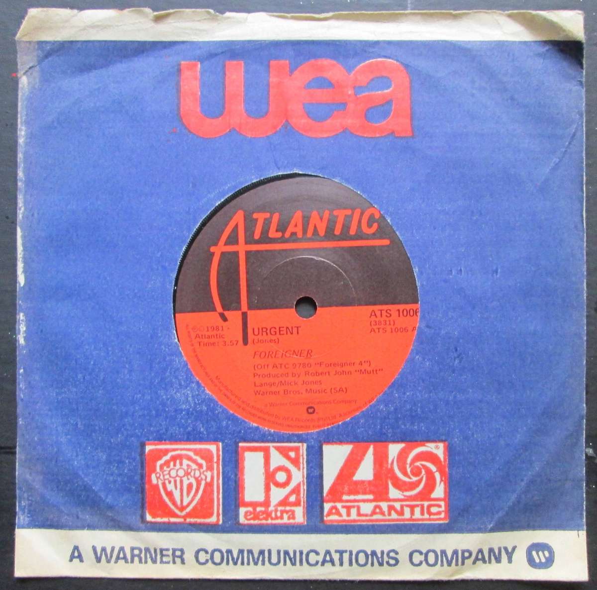 FOREIGNER - URGENT / GIRL ON THE MOON    (7 SINGLE/VINYL)