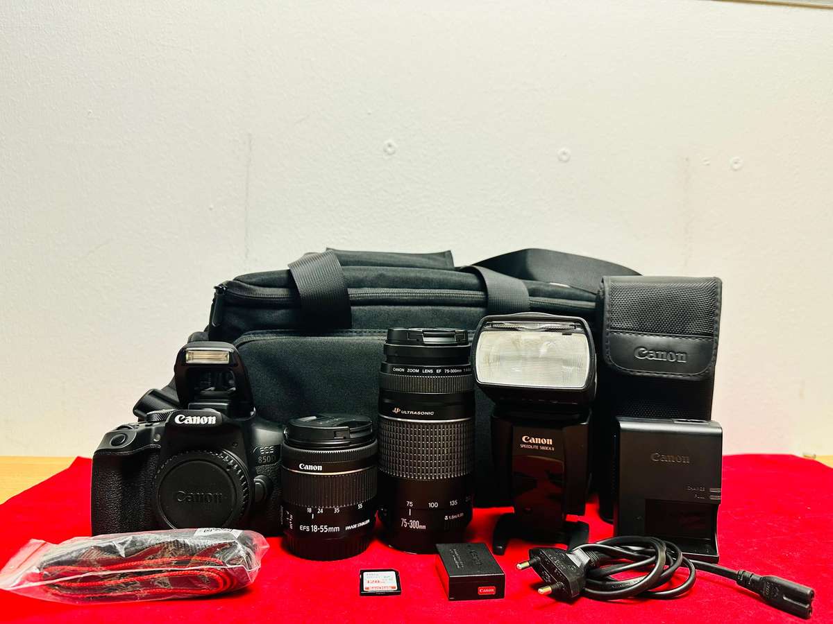 Canon EOS 850D with canon 2x lens and flash light & accessories