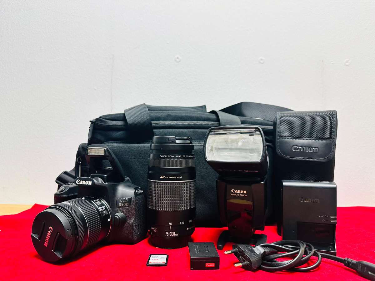 Canon EOS 850D with canon 2x lens and flash light & accessories