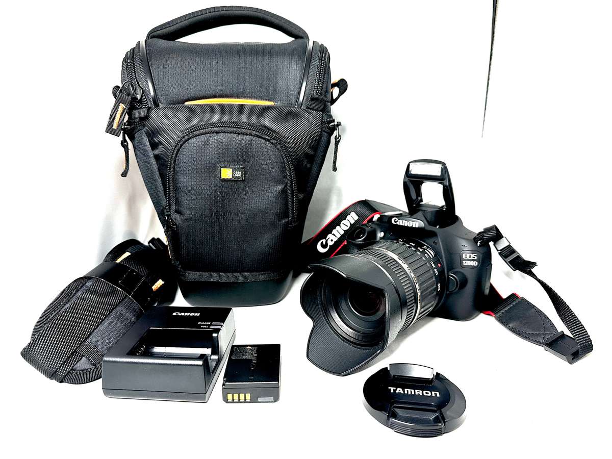 Canon EOS1200D DSLR camera with Tamron 18-200mm Lens and accessories