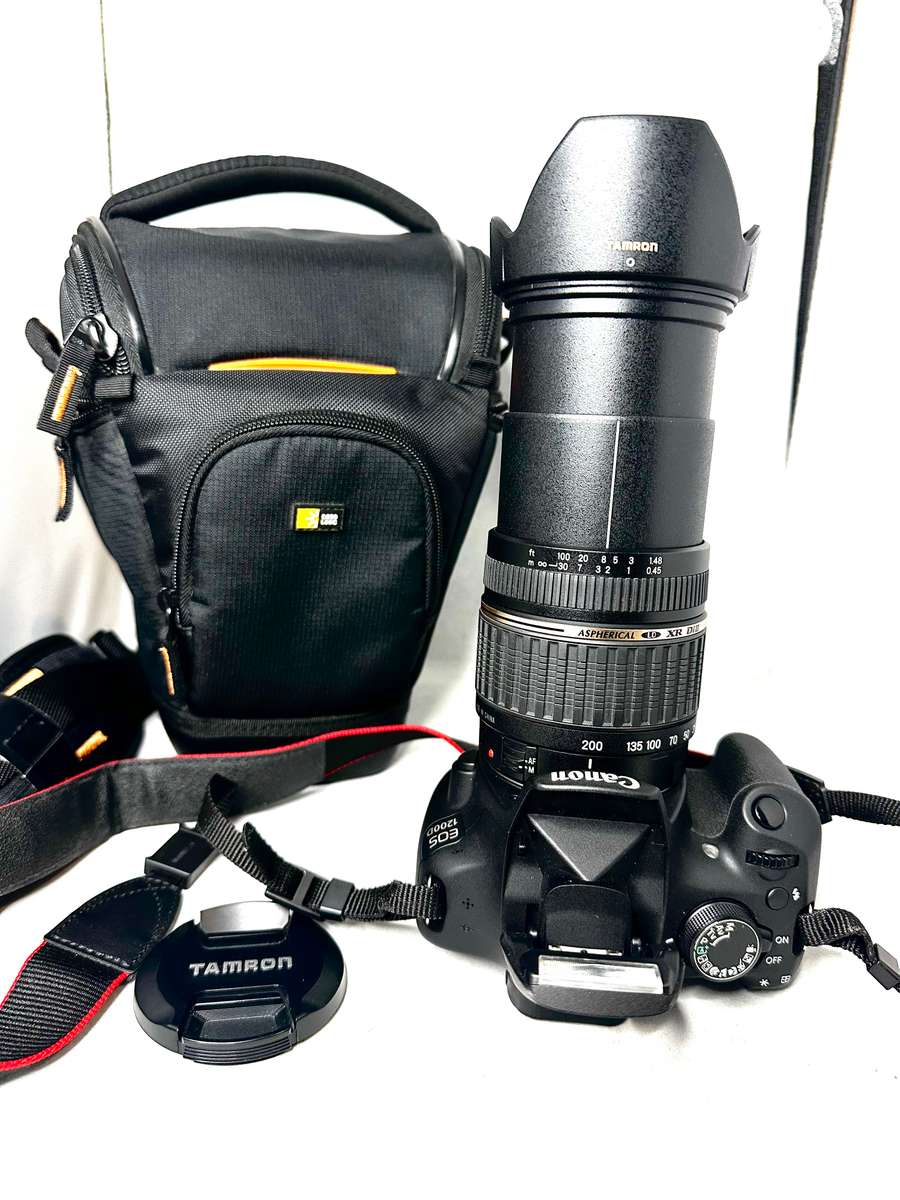 Canon EOS1200D DSLR camera with Tamron 18-200mm Lens and accessories