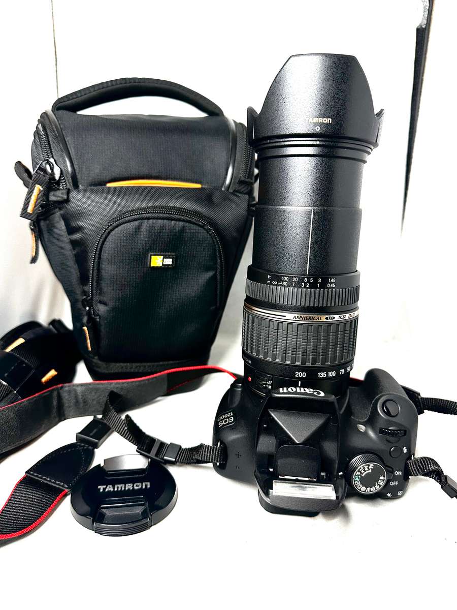 Canon EOS1200D DSLR camera with Tamron 18-200mm Lens and accessories