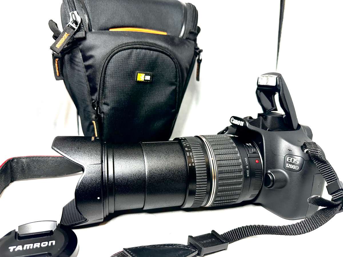 Canon EOS1200D DSLR camera with Tamron 18-200mm Lens and accessories