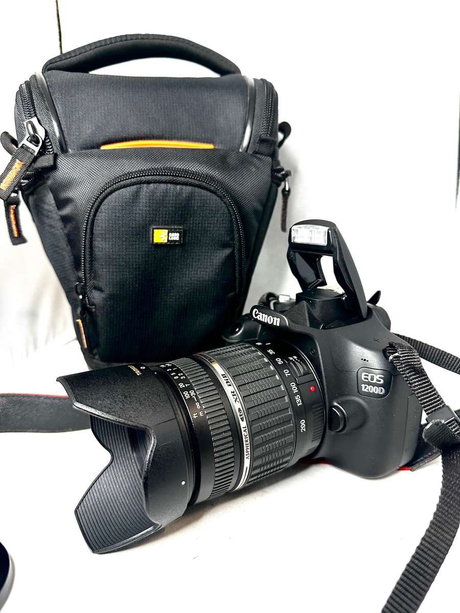 Canon EOS1200D DSLR camera with Tamron 18-200mm Lens and accessories