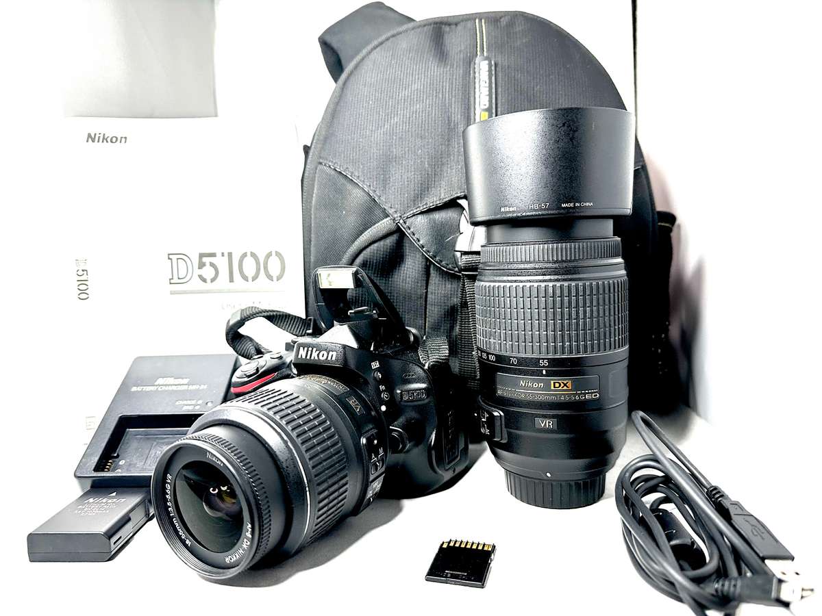 Nikon D5100 with 2x Lens and accessories + Bag