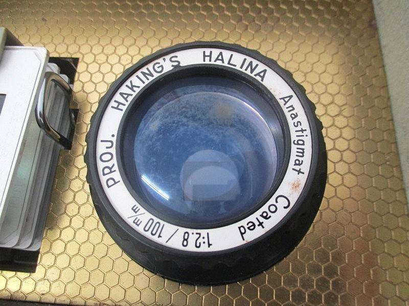 Vintage Halinamat 300 Slide Projector With An Attached Carousel And A Number Of Slides