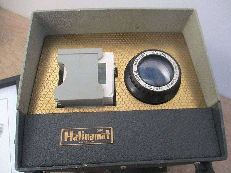 Vintage Halinamat 300 Slide Projector With An Attached Carousel And A Number Of Slides