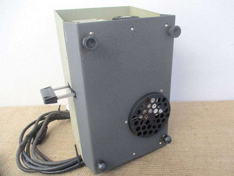 Vintage Halinamat 300 Slide Projector With An Attached Carousel And A Number Of Slides