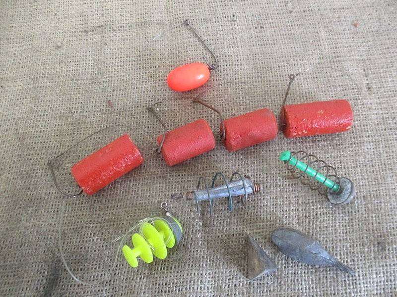 A Plastic Toolbox With A Variety Of Various Fishing Tackle Equipment