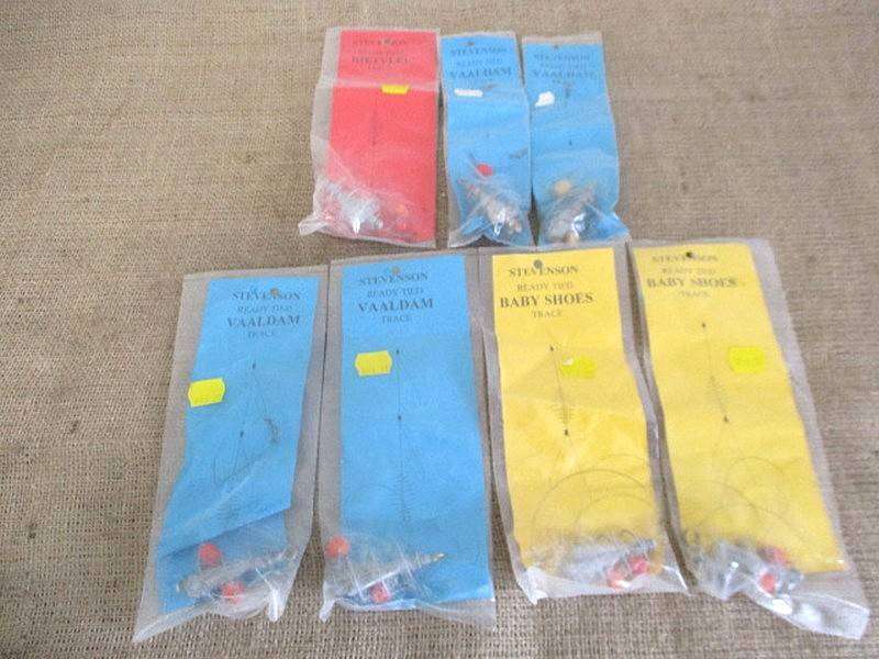 A Plastic Toolbox With A Variety Of Various Fishing Tackle Equipment