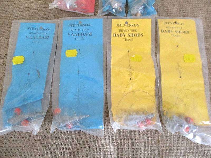 A Plastic Toolbox With A Variety Of Various Fishing Tackle Equipment