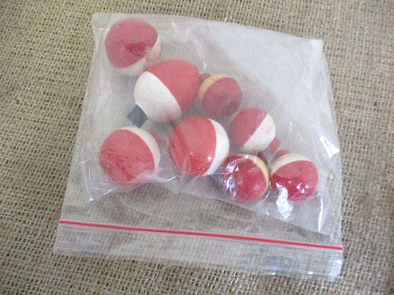 A Plastic Toolbox With A Variety Of Various Fishing Tackle Equipment