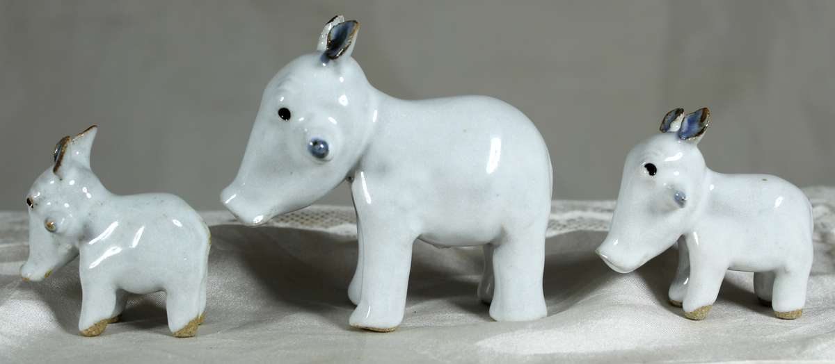 Porcelain warthog family
