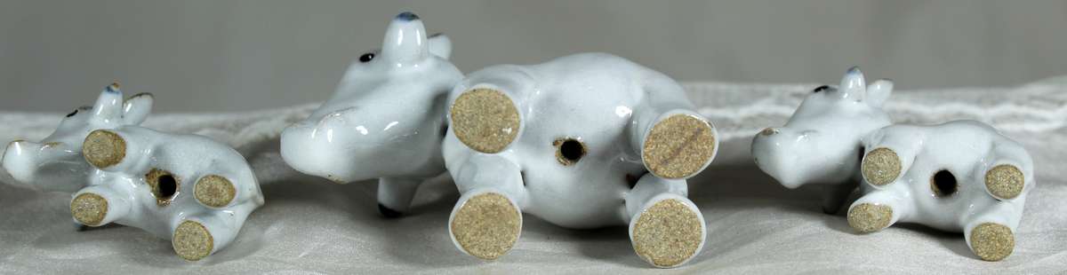 Porcelain warthog family