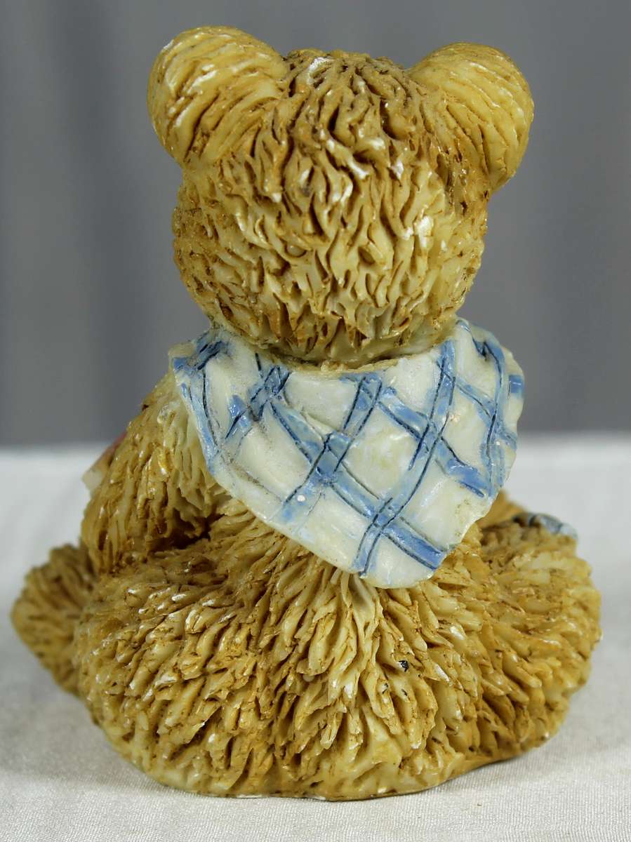 Little boy bear with soccer ball