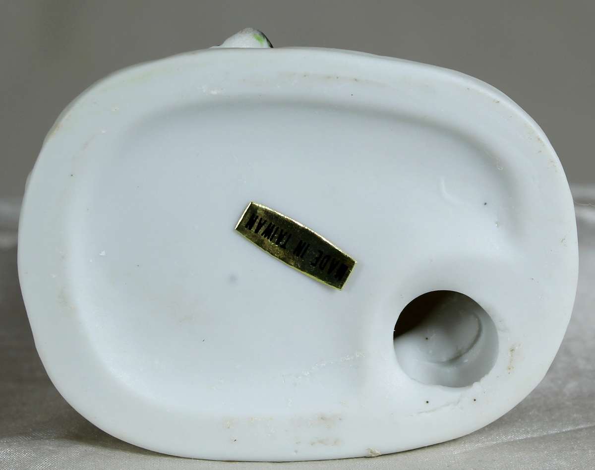 Little girl with a broom plus a rabbit