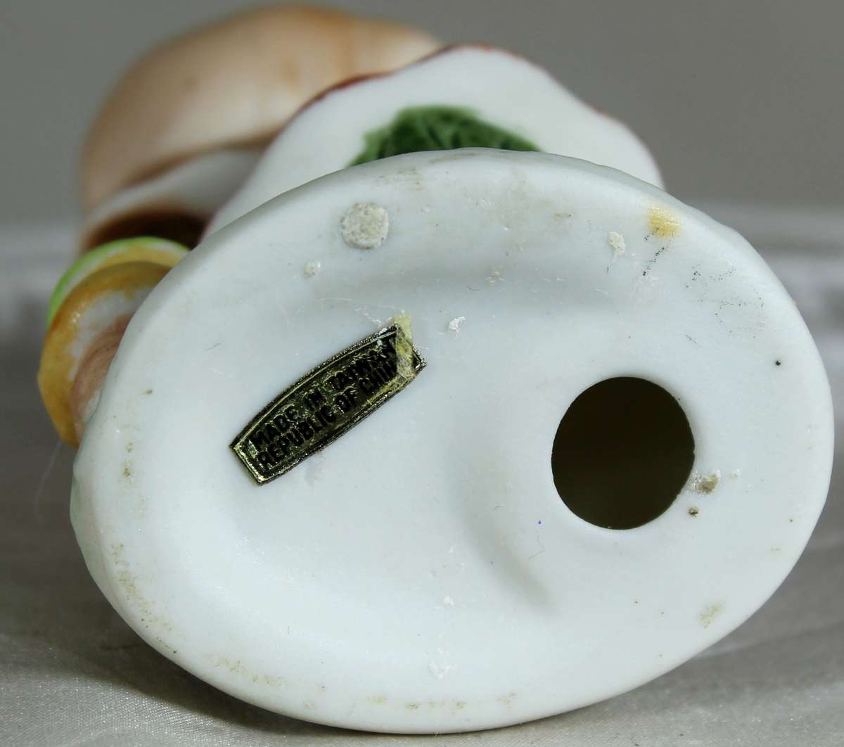 Little girl with a frog