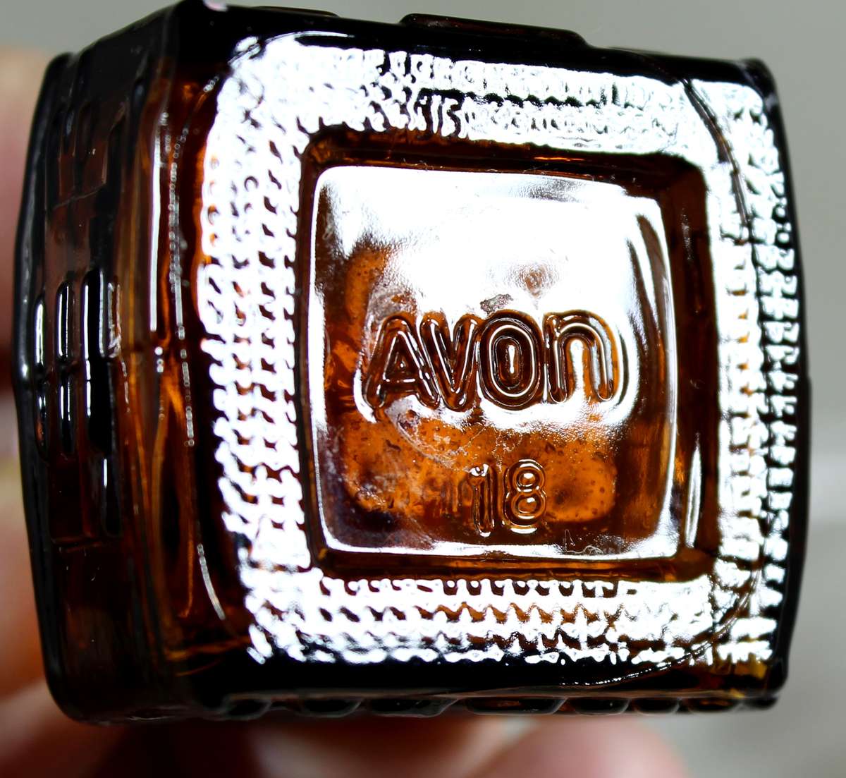 Avon miniature gingerbread house with pink trim