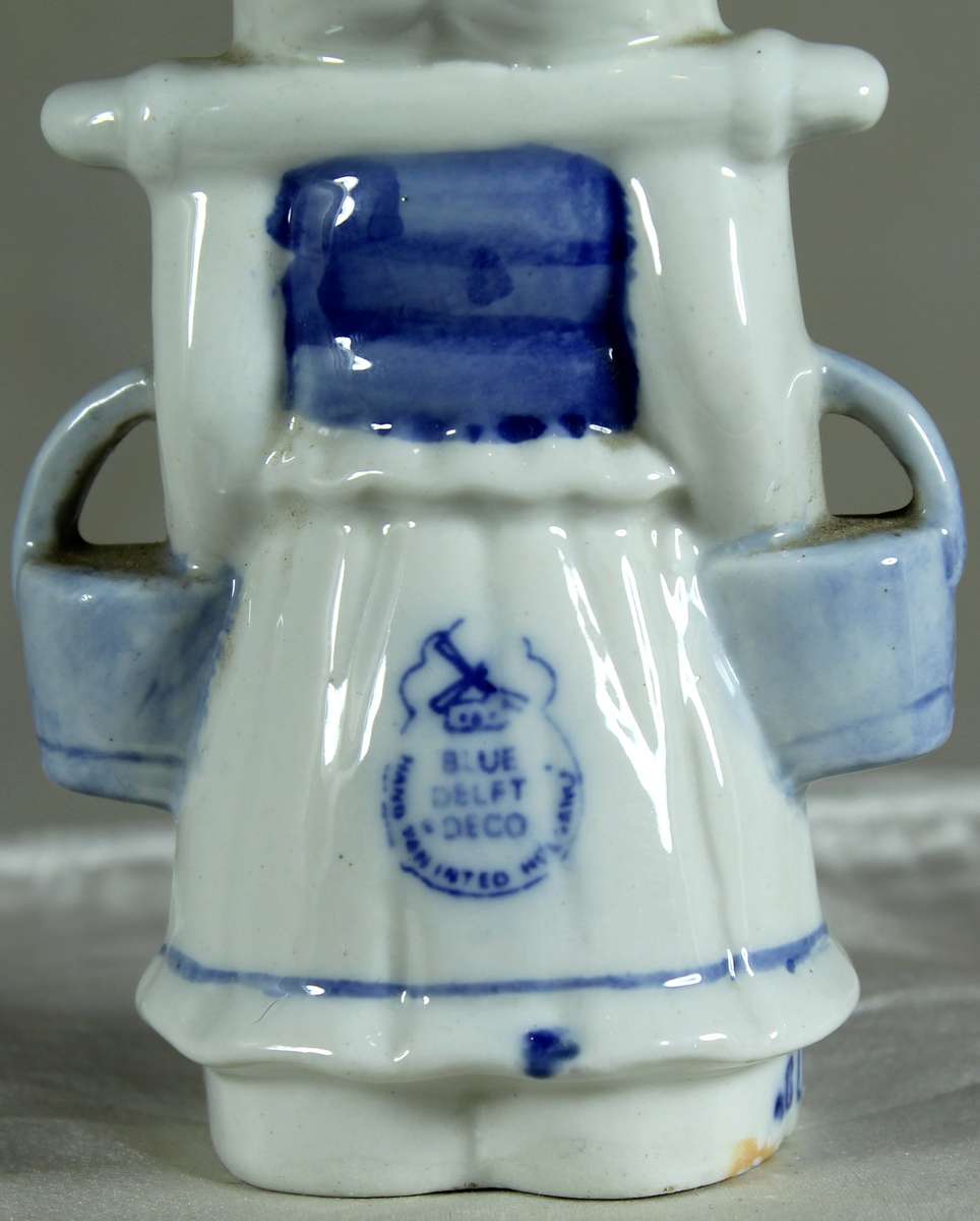 Blue Delft Dutch lady carrying water