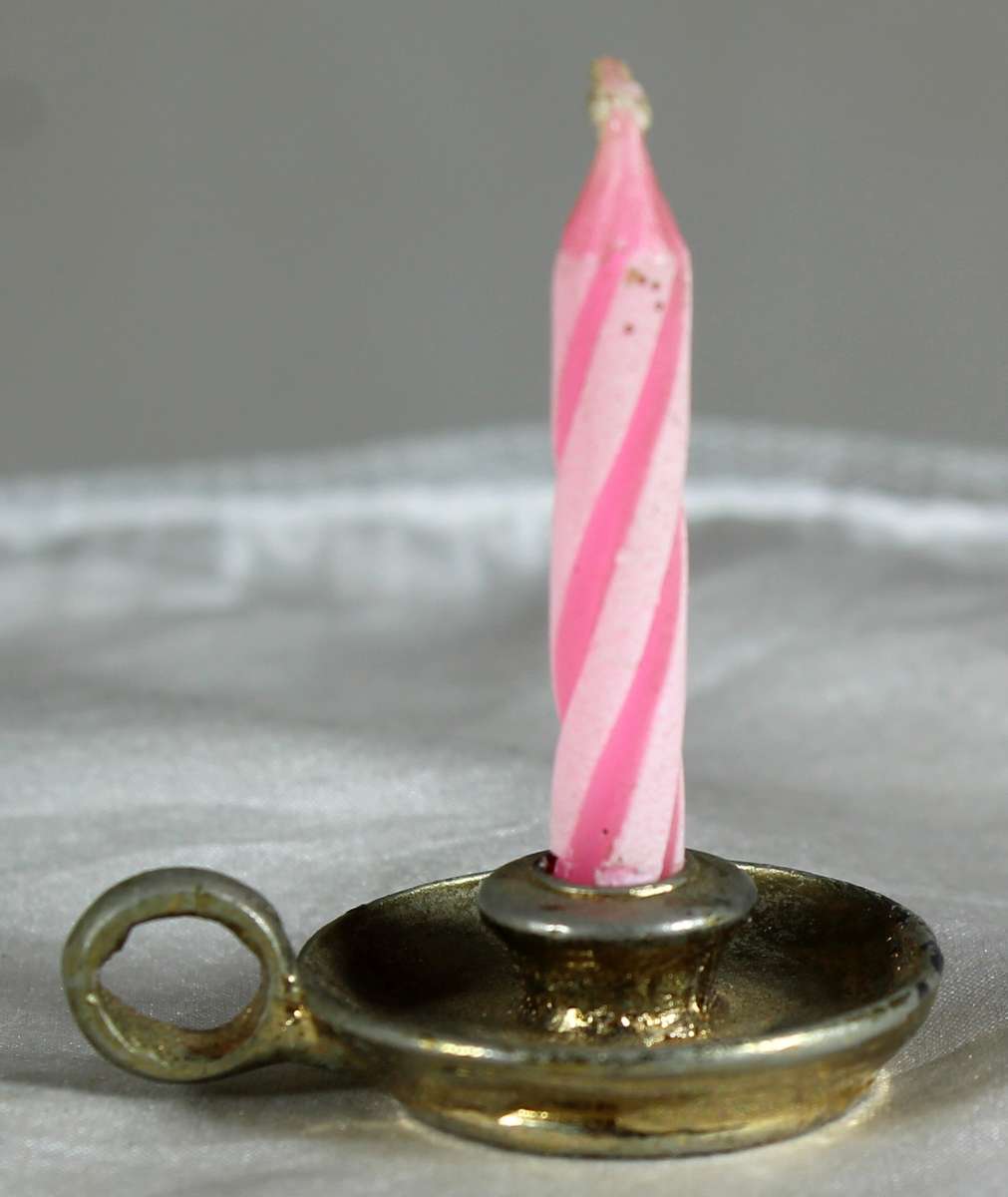 Miniature brass candle holder