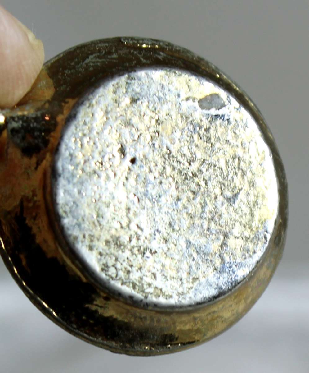 Miniature brass candle holder