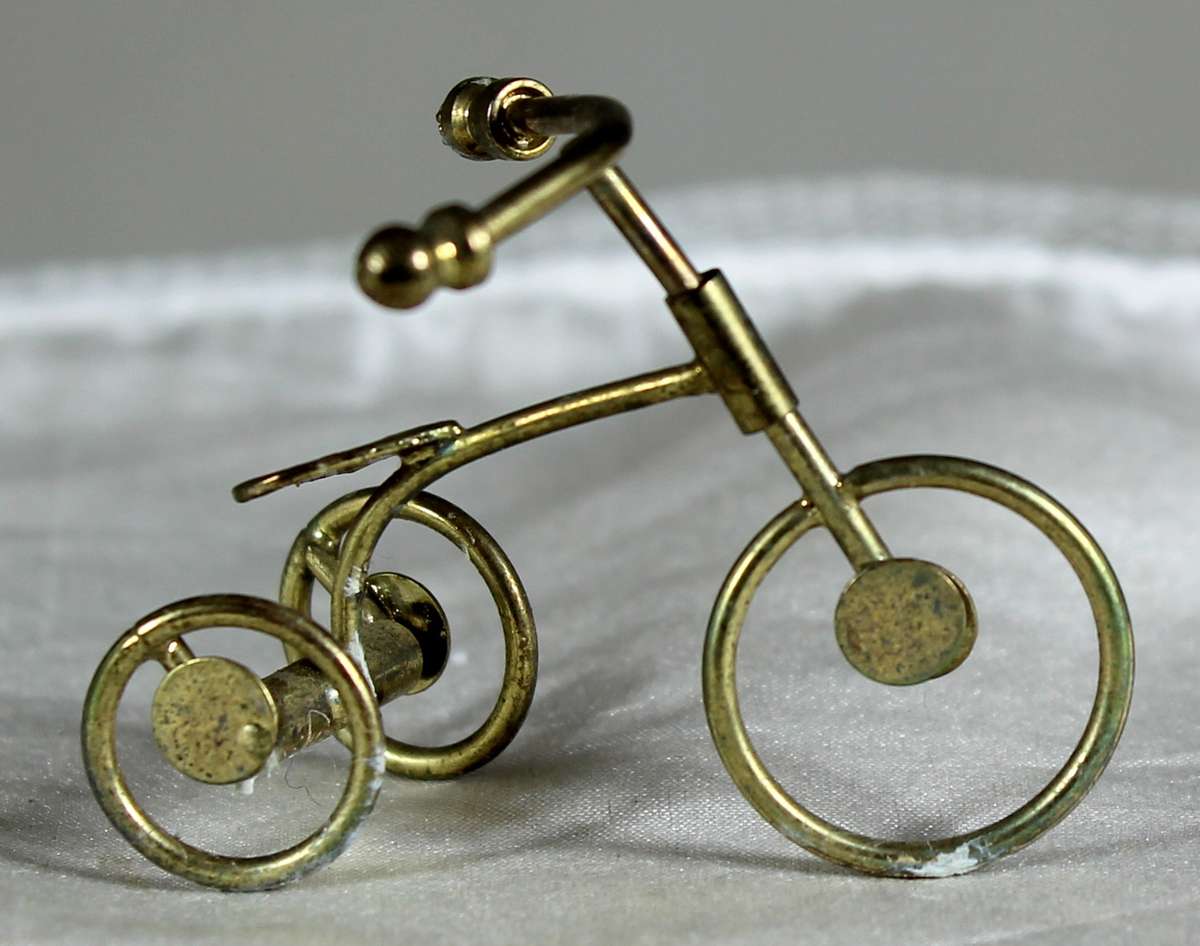 Miniature brass tricycle