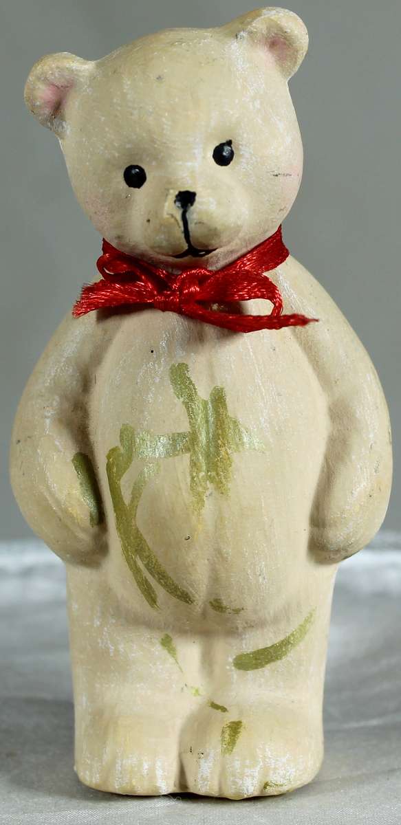 Small bear with a red bowtie