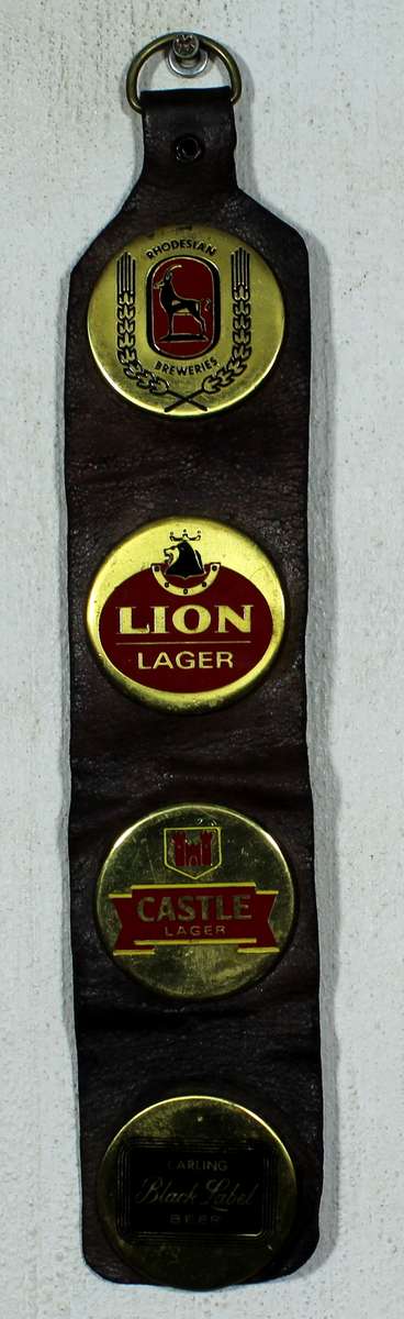 Rhodesian Breweries - Lion, Castel, Black Label brass medallions on leather strap