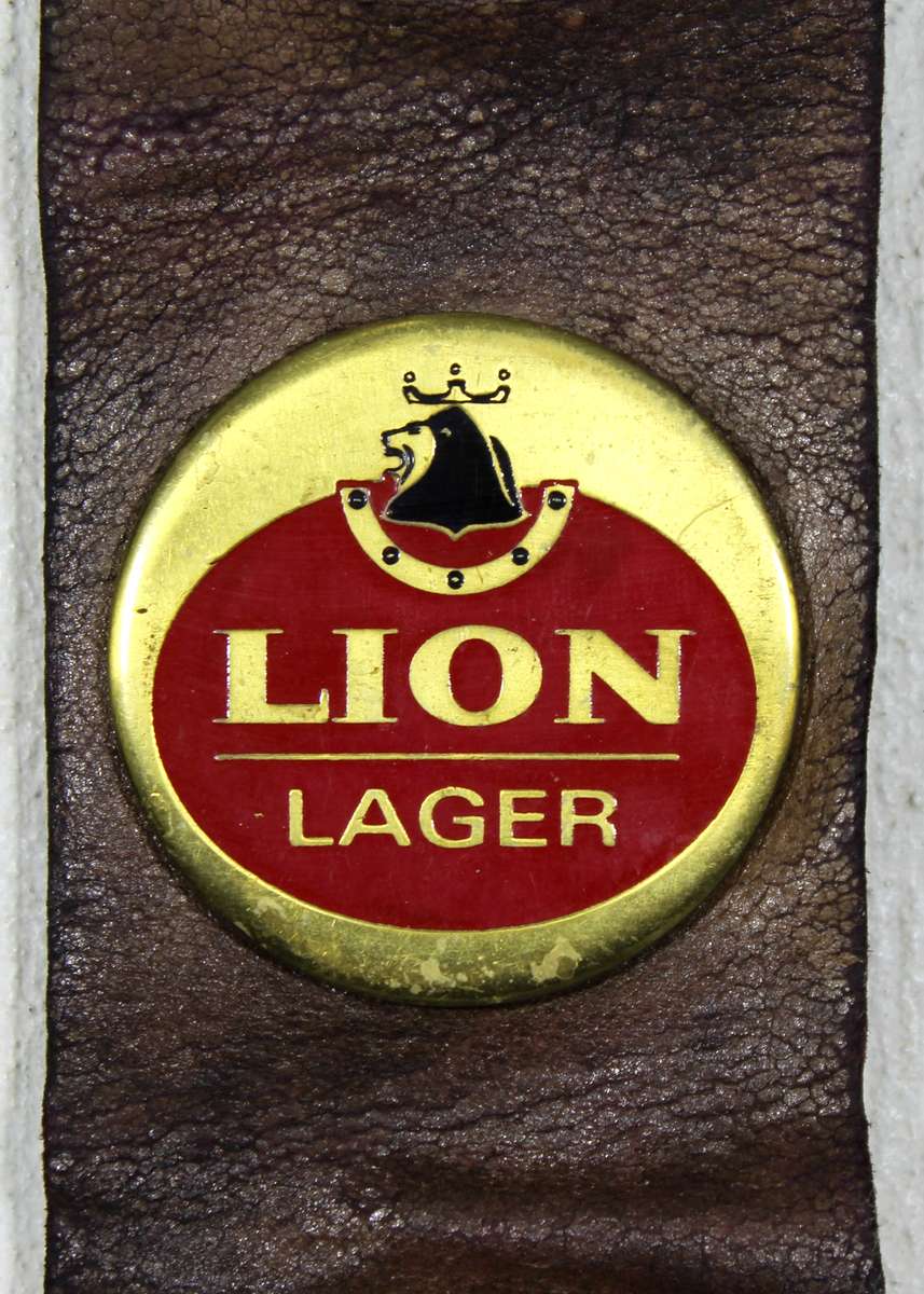 Rhodesian Breweries - Lion, Castel, Black Label brass medallions on leather strap