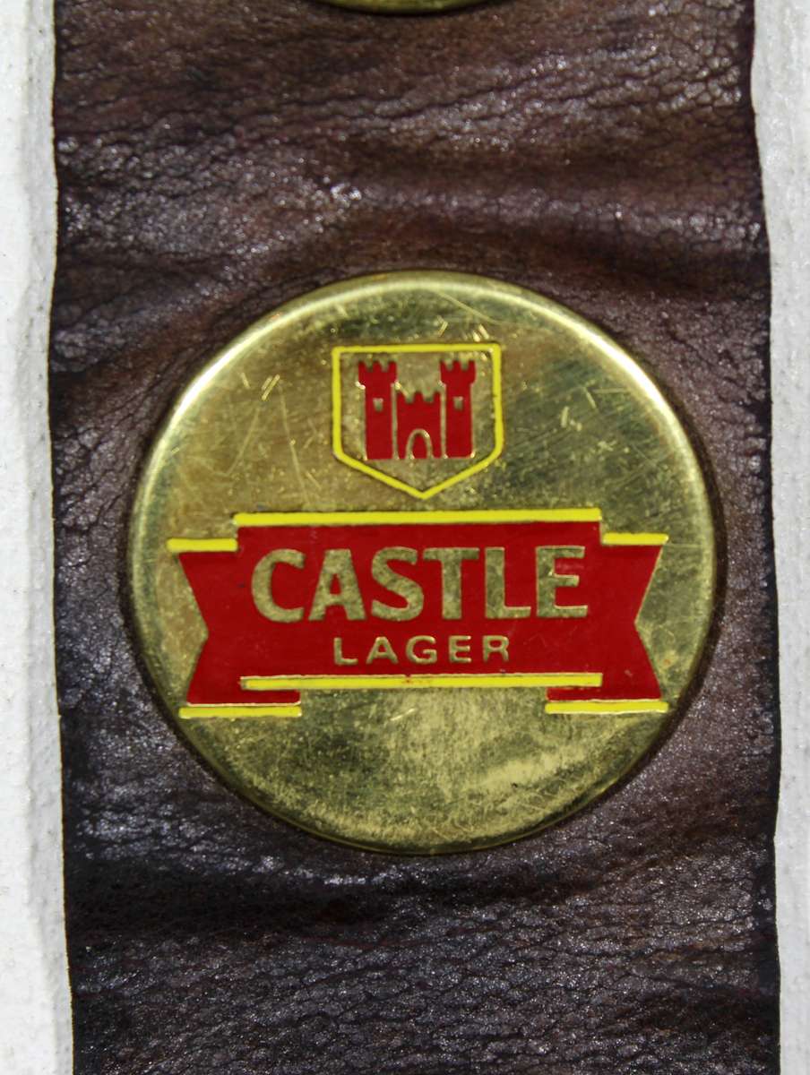 Rhodesian Breweries - Lion, Castel, Black Label brass medallions on leather strap