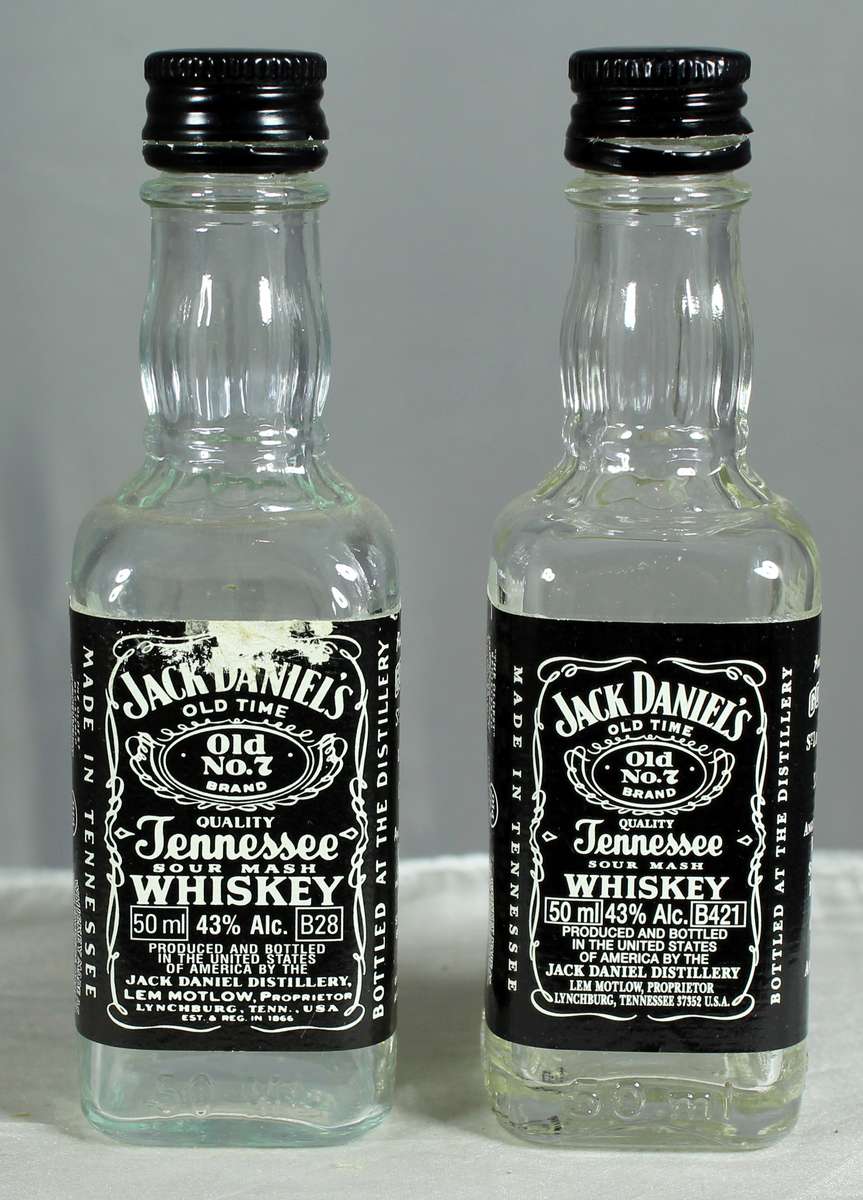 Empty liquor bottles - Pair of Jack Daniels whiskey
