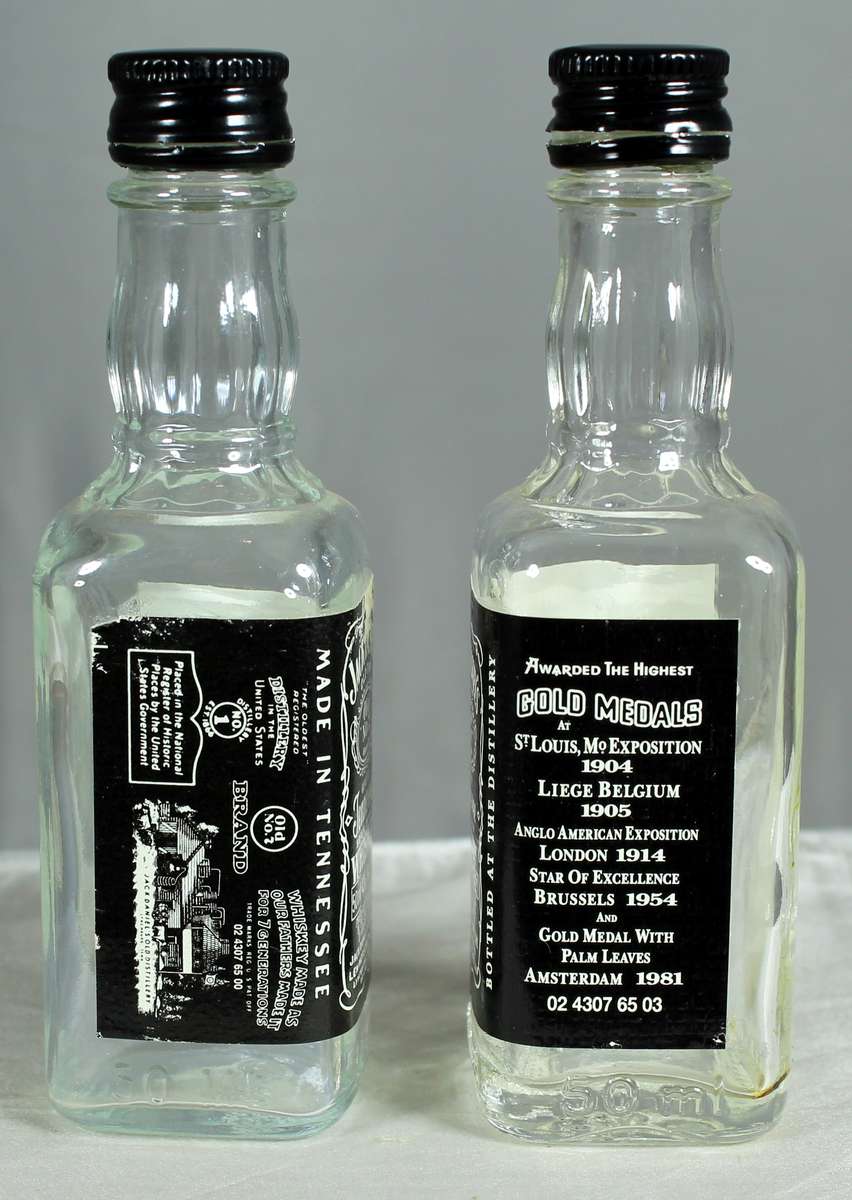 Empty liquor bottles - Pair of Jack Daniels whiskey