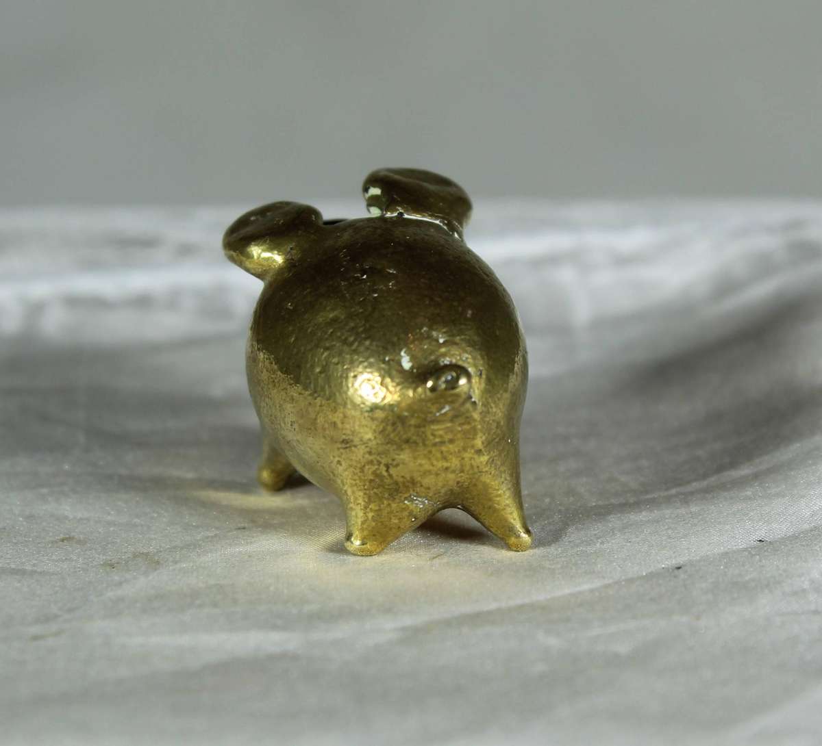Miniature brass piggy