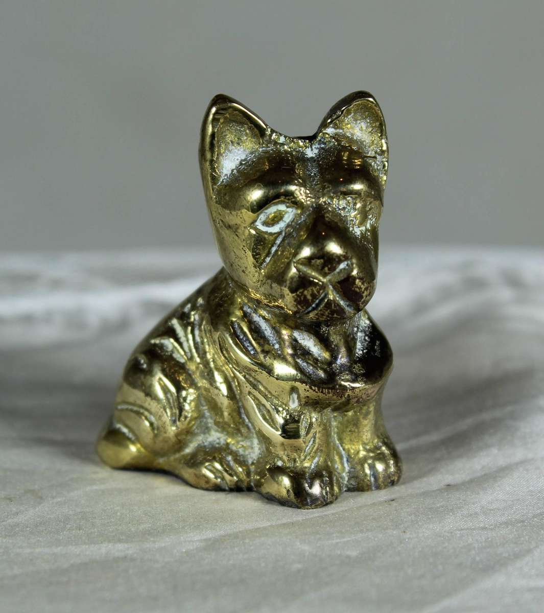 Miniature brass Scottie