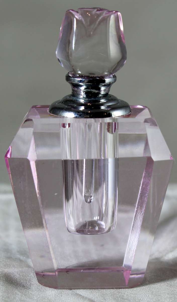 Mini pink glass perfume bottle